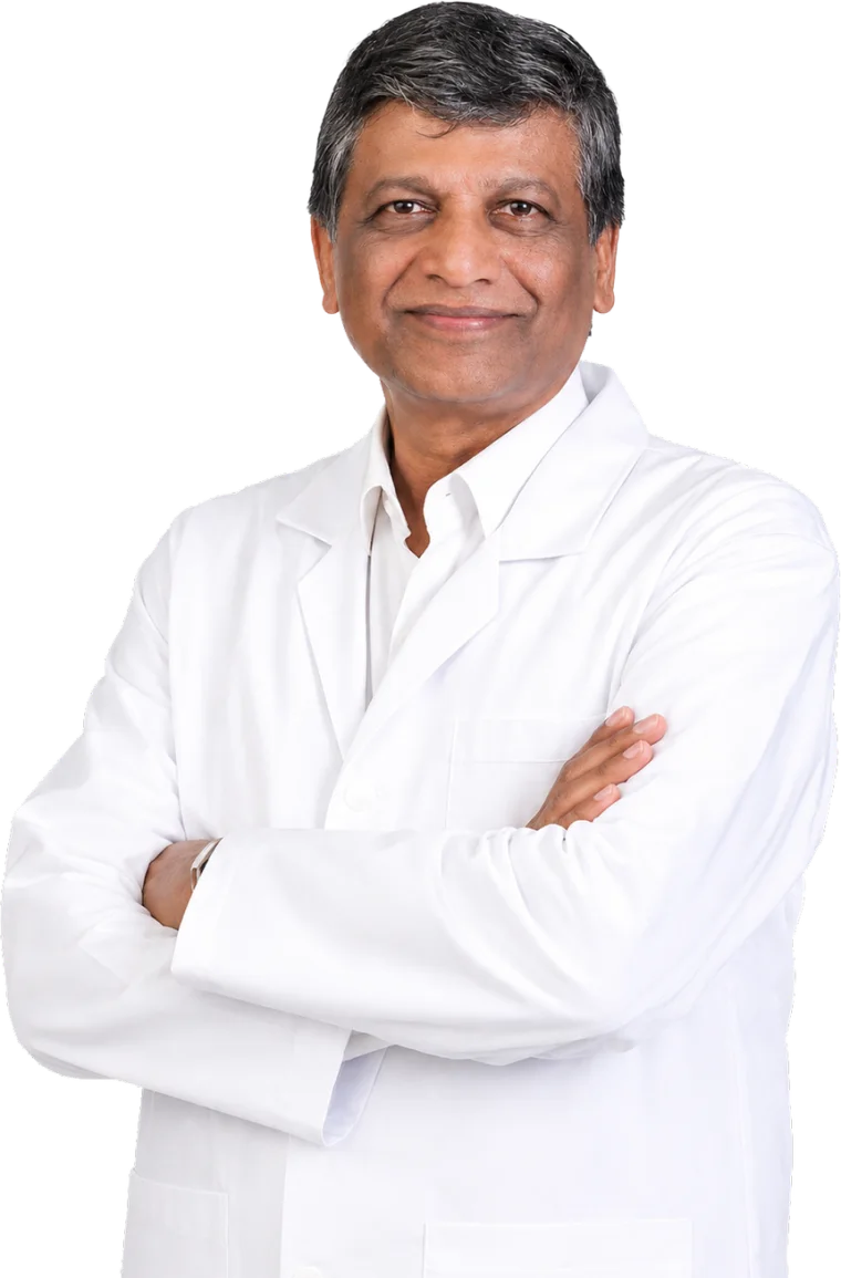 Dr. Shekar Patil, founder, senior medical oncologist in a white coat