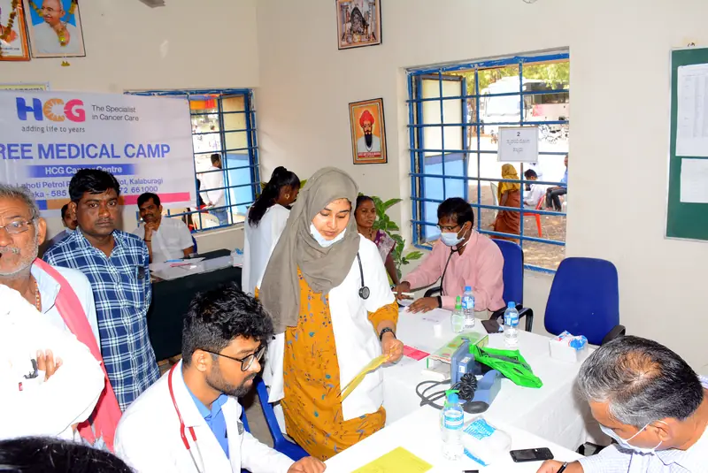 Doctors at the HCG free medical camp, where confirmed cases are referred for specialist care